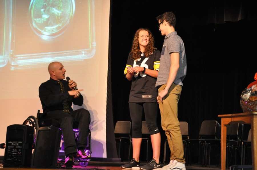Ashley Cameron and Anthony Morelli participate in a demonstration with guest speaker Nick Scott