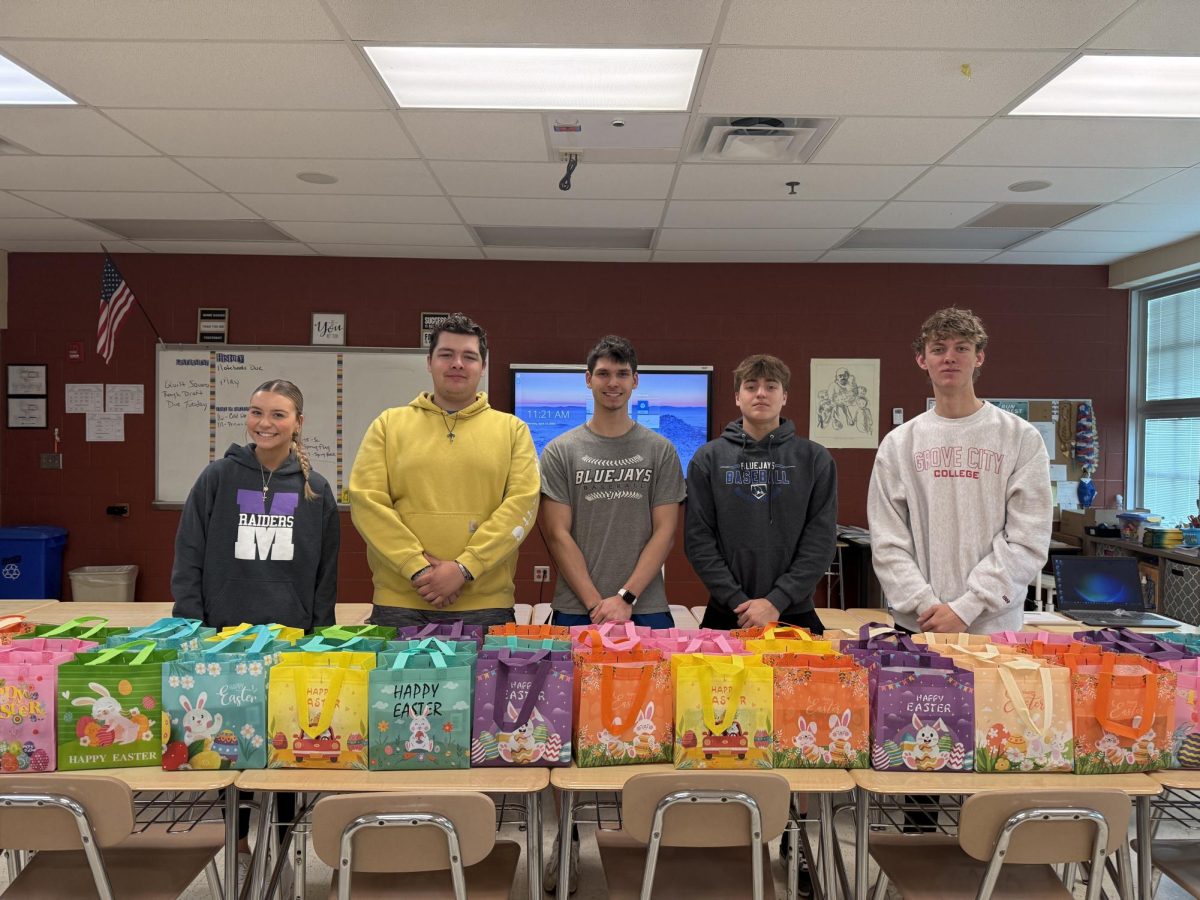 NHS “Hops” over to Antonine Village to deliver Easter Baskets